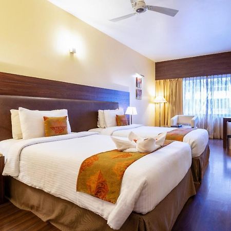 The Woodrose Hotel Bangalore Exterior photo